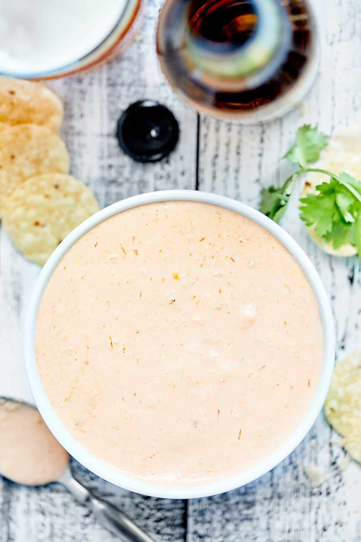 Cream cheese salsa dip in bowl above