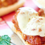 This Crockpot Meatball Sub Sandwich is made with a french baguette, an easy spaghetti sauce, juicy slow cooker meatballs, and fresh mozzarella cheese! showmetheyummy.com #meatball #crockpot