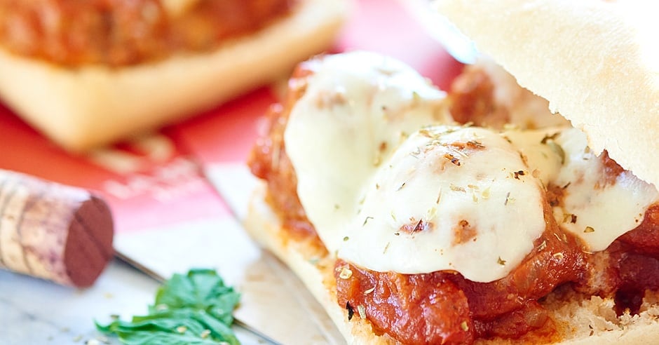 This Crockpot Meatball Sub Sandwich is made with a french baguette, an easy spaghetti sauce, juicy slow cooker meatballs, and fresh mozzarella cheese! showmetheyummy.com #meatball #crockpot