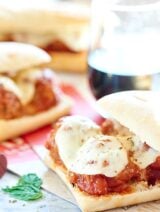 This Crockpot Meatball Sub Sandwich is made with a french baguette, an easy spaghetti sauce, juicy slow cooker meatballs, and fresh mozzarella cheese! showmetheyummy.com #meatball #crockpot