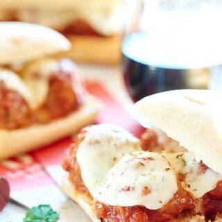 This Crockpot Meatball Sub Sandwich is made with a french baguette, an easy spaghetti sauce, juicy slow cooker meatballs, and fresh mozzarella cheese! showmetheyummy.com #meatball #crockpot