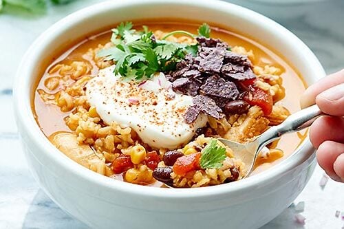 https://showmetheyummy.com/wp-content/uploads/2015/09/One-Pot-Mexican-Chicken-and-Rice-Soup-Horizontal-500x333.jpg