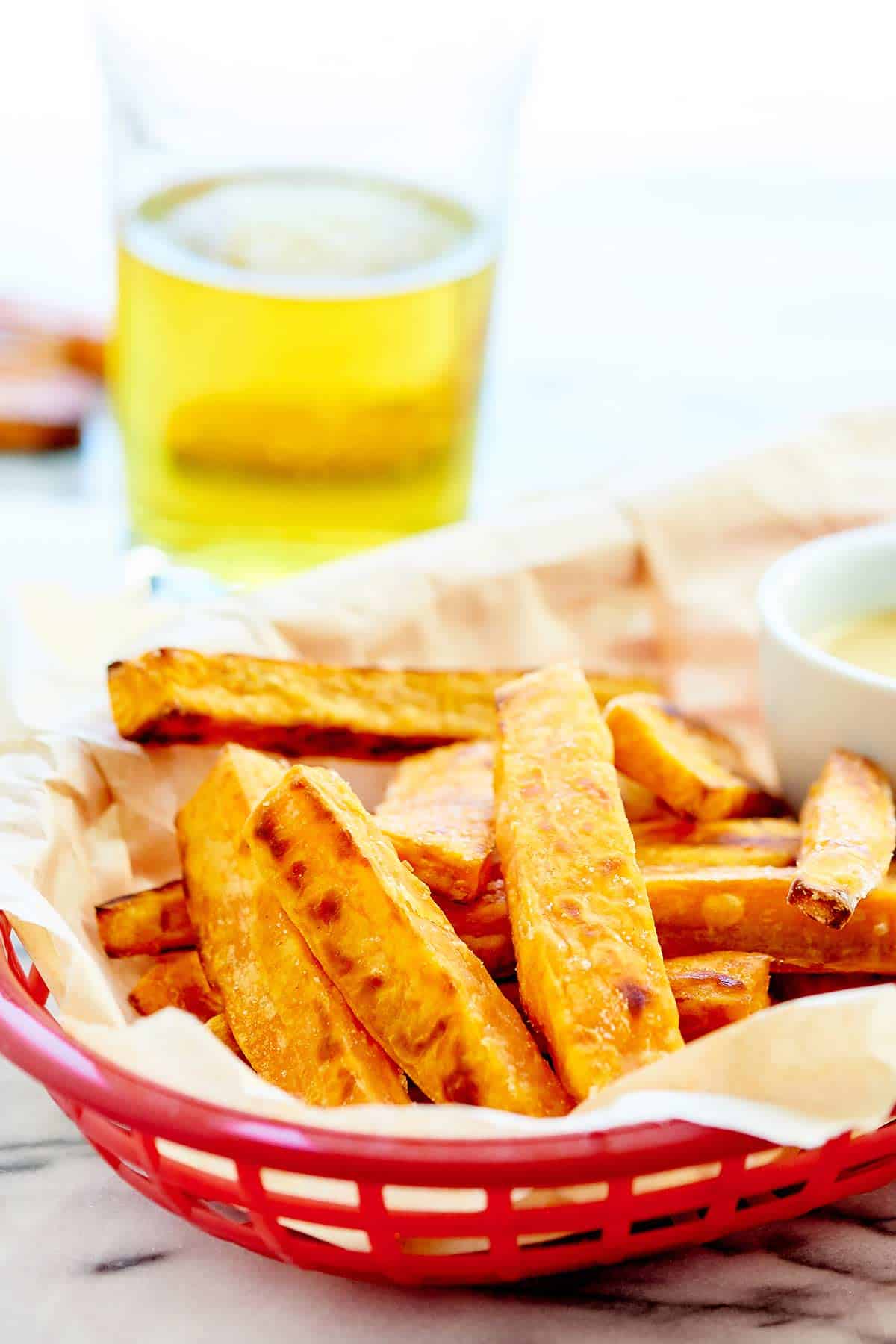 Baked sweet potato fries in basket