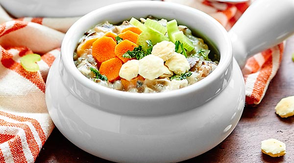This Crockpot Chicken Wild Rice Soup is such an easy recipe! It’s also healthy, full of tender vegetables, seasoned with rosemary and thyme, and made creamy with non fat plain greek yogurt! showmetheyummy.com #crockpot #soup