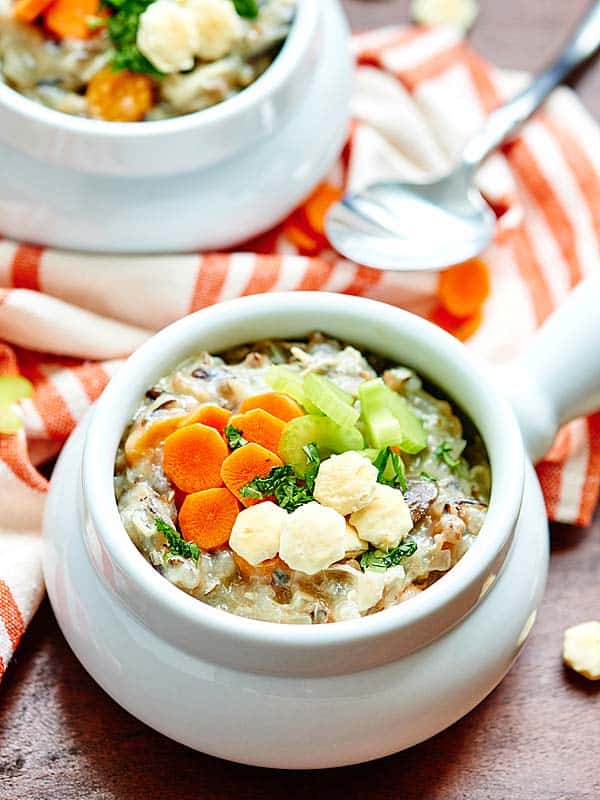 This Crockpot Chicken Wild Rice Soup is such an easy recipe! It’s also healthy, full of tender vegetables, seasoned with rosemary and thyme, and made creamy with non fat plain greek yogurt! showmetheyummy.com #crockpot #soup