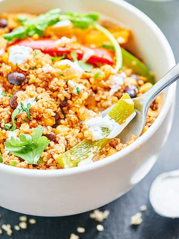 This Healthy Mexican Casserole is full of good for you ingredients like ground turkey, quinoa, black beans & bell peppers! Healthy Mexican food? Yes please! showmetheyummy.com #mexican #healthy 