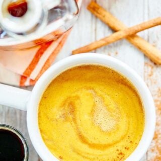 This Maple Pumpkin Spice Latte is easy to make, naturally sweetened, uses real pumpkin, so much cheaper than store-bought, and oh yea, tastes amazing! showmetheyummy.com #pumpkinspicelatte #maple #pumpkin #coffee