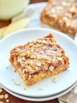 These Salted Caramel Apple Bars are everything! Shortbread crust + apple slices + homemade salted caramel + streusel crumbly topping = best fall dessert! showmetheyummy.com #apple #caramel