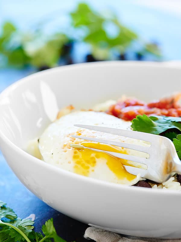 egg being cut with fork