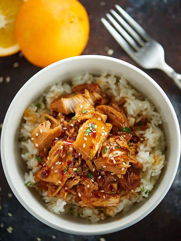 Orange chicken and rice in a bowl above