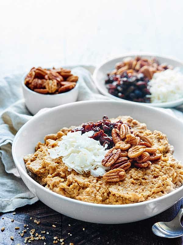bowl of pumpkin oatmeal with quinoa in bowl