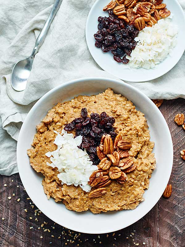 crockpot pumpkin oatmeal with quinoa in bowl above