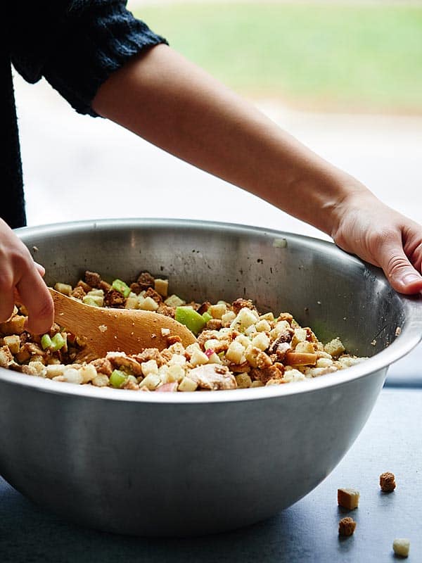 stuffing ingredients being stirred in mixing bowl