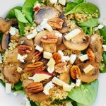 This Warm Mushroom Quinoa Salad is full of mushrooms and quinoa, spinach, goat cheese, pecans, and is smothered in a honey and apple cider vinegar dressing! showmetheyummy.com #quinoa #salad