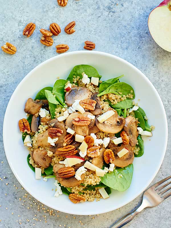 warm mushroom quinoa salad on plate above