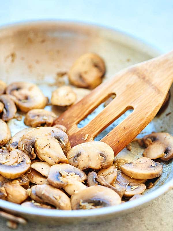 mushrooms being cooked