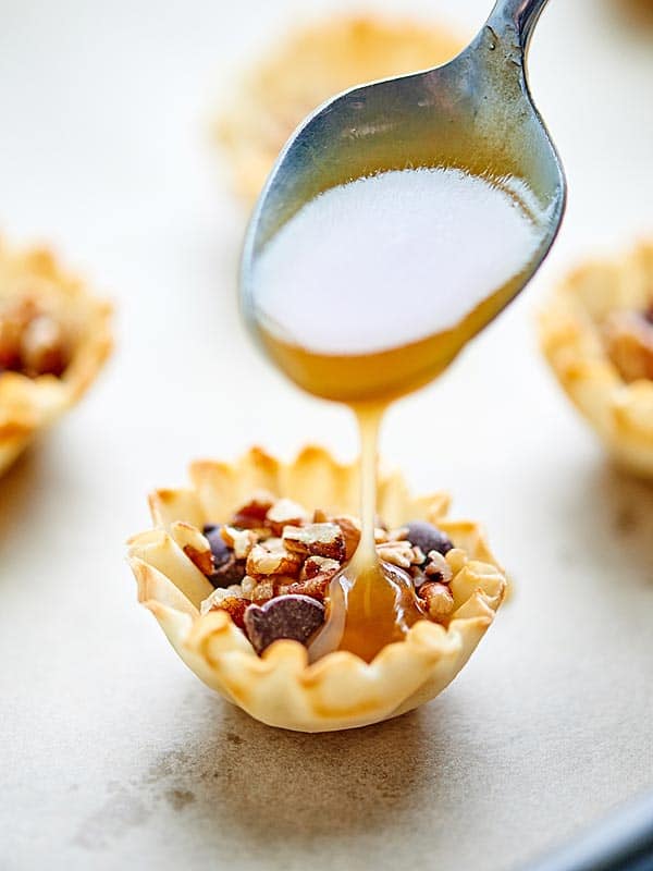 maple bourbon caramel drizzled over pecan pie bite