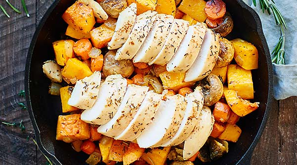 This Roast Chicken with Vegetables is healthy & full of vegetables like butternut squash & brussels sprouts & marinated in apple cider vinegar & honey! Healthy, cozy, and delicious! showmetheyummy.com #healthy #easyrecipe
