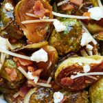 This Roasted Brussels Sprouts Recipe is smothered in a bacon fat, maple syrup, balsamic vinegar dressing and tossed with goat cheese, parmesan, and bacon! showmetheyummy.com #brusselssprouts #thanksgiving