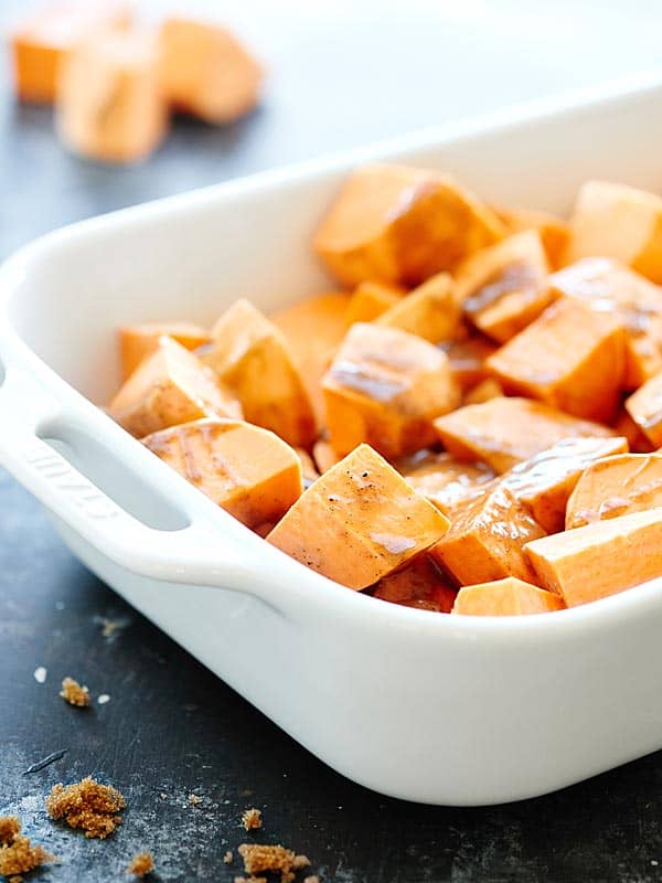 cubed sweet potatoes in baking dish