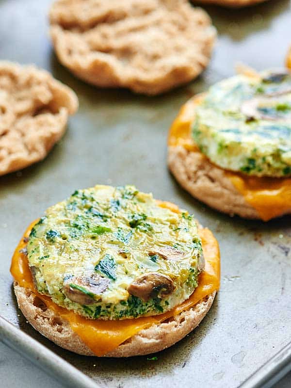 Healthy breakfast sandwiches on baking sheet