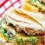 A healthy breakfast sandwich made of eggs, veggies, & optional turkey & cheese! Make these the day of or make them in advance & store in the freezer! showmetheyummy.com #healthy #breakfast #sandwich