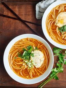 This One Pot Asian Noodle Soup is the perfect easy, healthy, vegetarian dinner! A twist on hot & sour soup, it's full of whole wheat noodles & poached eggs! showmetheyummy.com #healthy #vegetarian