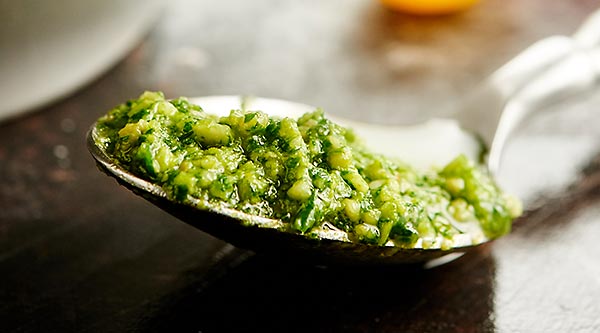 A fun twist on classic pesto, this cilantro pesto recipe is quick and easy, completely delicious, and is full of limes, roasted cashews, garlic, parmesan, and of course, cilantro! This is great over pasta, chicken…anything! showmetheyummy.com #pesto #vegetarian