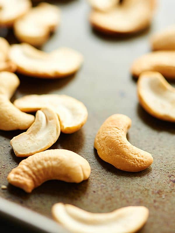 Roasted pistachios on baking sheet