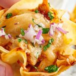 Chicken Wonton Cups made two ways. Wonton cups are filled with a spicy buffalo, blue cheese filling or a sweet BBQ, jack cheese filling and baked to golden perfection! showmetheyummy.com #wontoncups #buffalochicken