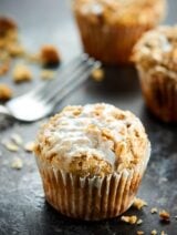These Coffee Cake Muffins are perfectly cinnamon-y, fluffy, tender, moist, are stuffed with a brown sugar, cinnamon filling, & topped with a crunchy streusel! showmetheyummy.com #muffins #coffeecake