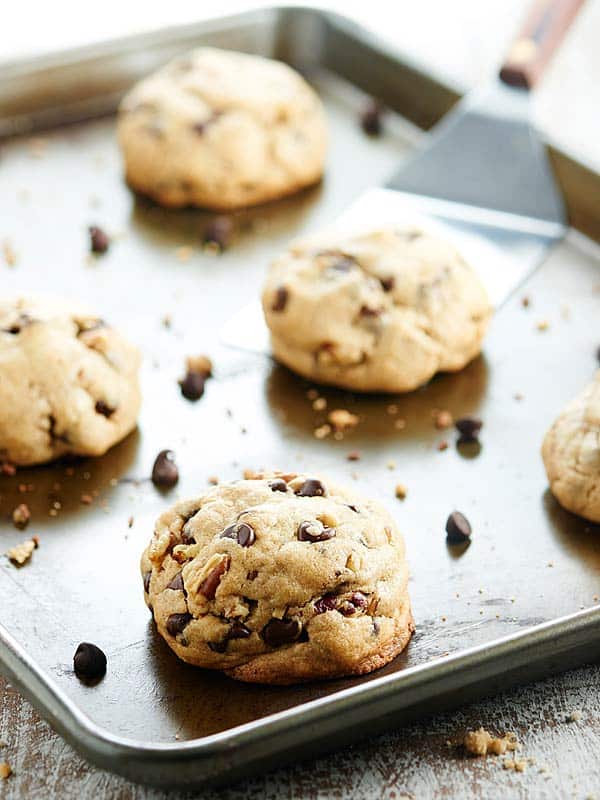 If you love fluffy, soft, dense, gooey cookies, then this Fluffy Chocolate Chip Cookies Recipe with toasted pecans and two kinds of chocolate is for you! showmtheyummy.com #chocolatechipcookies #cookies