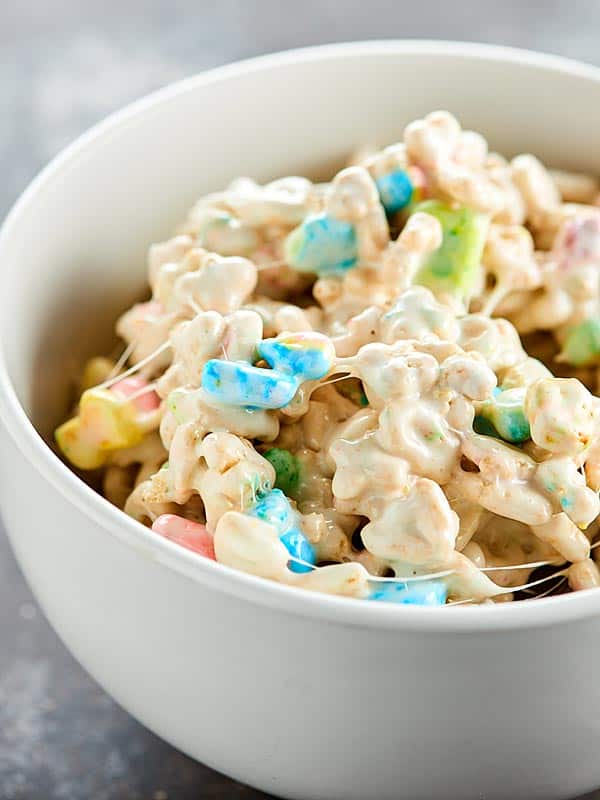 I love these Lucky Charms Marshmallow Treats, because they're crunchy, they're a little salty, so buttery, and hello, there are TWO kinds of marshmallows! showmetheyummy.com #ricekrispietreats #luckycharms