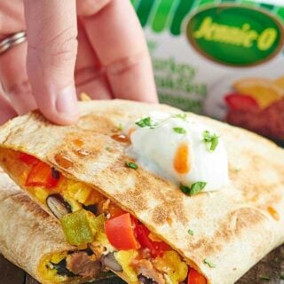 This Sausage Breakfast Quesadilla Recipe is healthy, easy, freezer friendly, can be made in advance, & is full of lean turkey sausage and plenty of veggies! showemtheyummy.com #spon #jennieo @jennieorecipes