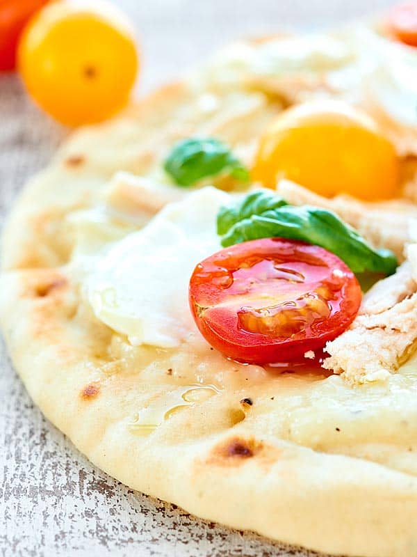 closeup of chicken naan pizza