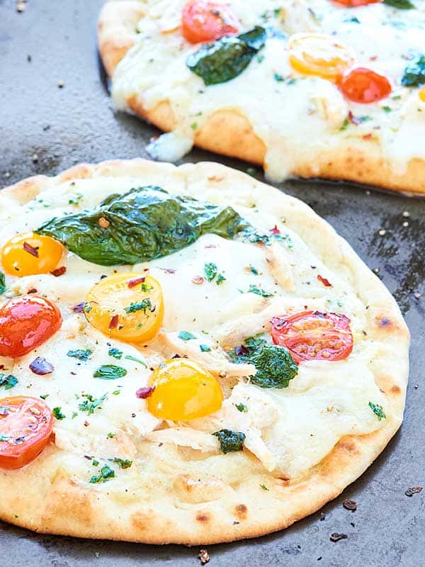 chicken naan pizza, another in background