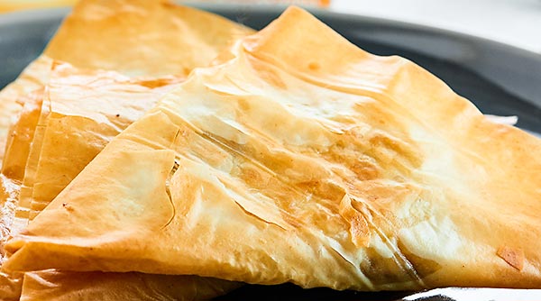 These Mushroom Puffs are SO simple and elegant. The mushroom filling is so creamy, spicy & the phyllo pastry is warm, flakey, & melt in your mouth buttery. showmetheyummy.com #ad #BoursinParty #Walmart @Walmart @Boursin