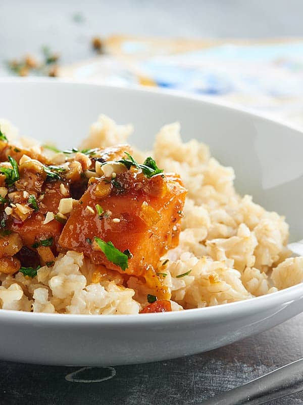 closeup of red chili tilapia over rice