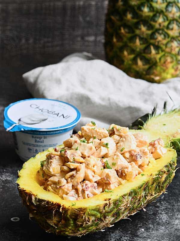 chipotle pineapple chicken salad in pineapple boat