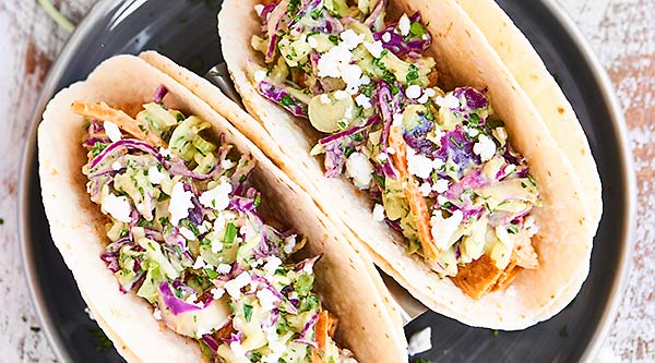 Juicy grilled chicken smothered in BBQ sauce plus crunchy, fresh, healthy coleslaw makes these the easiest & tastiest Grilled BBQ Chicken Tacos ever! showmetheyummy.com #ad #stubbsinsider @stubbsbbq