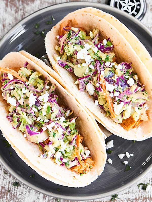 Two bbq chicken tacos above