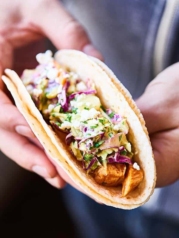 Grilled bbq chicken taco held