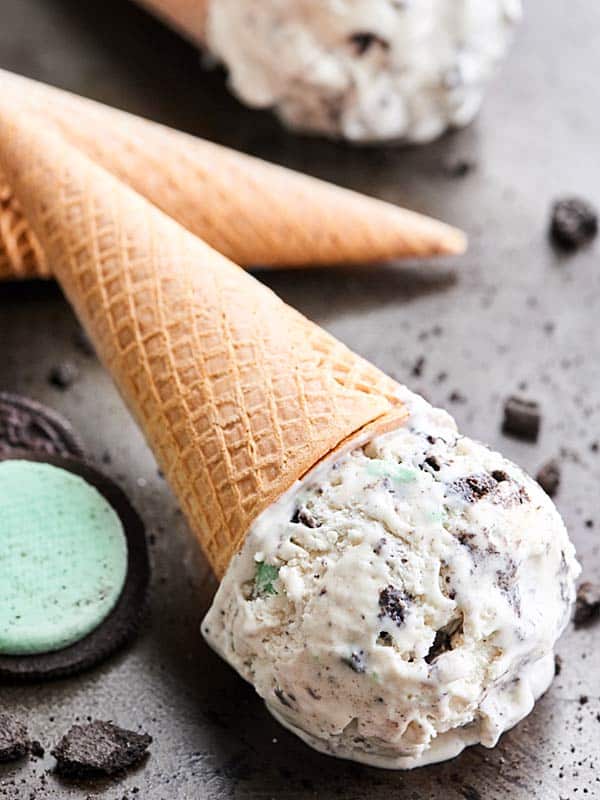 ice cream cone with no churn mint oreo ice cream laying on baking sheet
