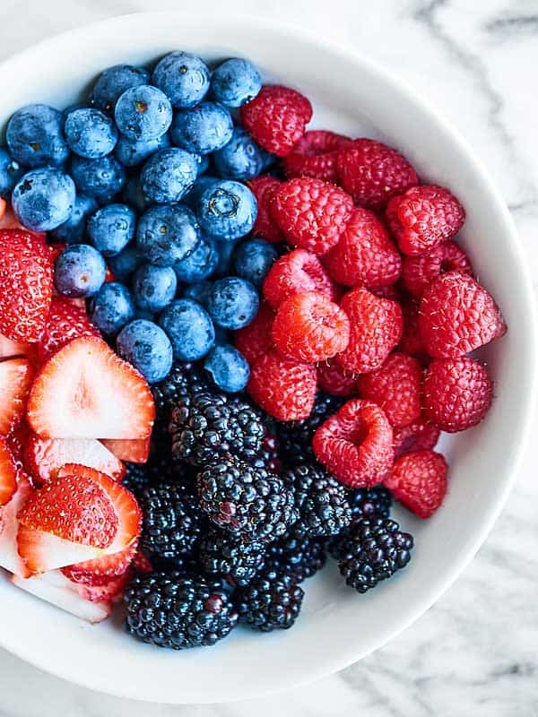 Blueberries, raspberries, strawberries, and blackberries in bowl