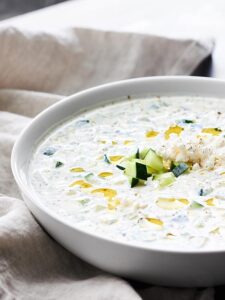 A simple sauce made of non fat plain greek yogurt, garlic, and cucumbers, this Easy Tzatziki Recipe comes together in a matter of minutes and is the perfect, healthy, flavorful addition to any meal! showmetheyummy.com #tzatziki #yogurtsauce