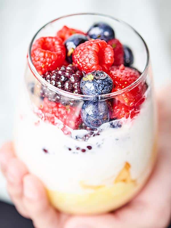 lemon cake parfait in cup held