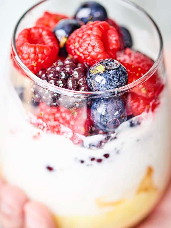 closeup of lemon cake parfait topped with berries