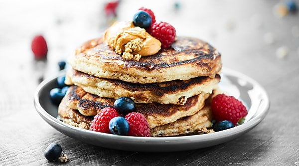 You guys are gonna FLIP for these classic Buttermilk Pancakes. Only 8 ingredients for ultra fluffy, perfectly sweet, incredibly easy pancakes! showmetheyummy.com Recipe adapted from Fast & Easy Five Ingredient Recipes: A Cookbook For Busy People #pancakes #sweetphicookbook