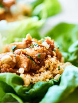 Have a few for a light lunch, or half the recipe for a filling and healthy dinner, these Healthy Asian Lettuce Wraps are full of tender chicken, a crazy flavorful sauce, and loads of texture! showmetheyummy.com #lettucewraps #asianlettucewraps