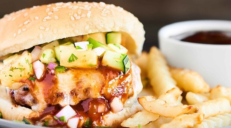 Pork burger with fries and bbq sauce